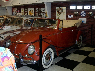 [Side view of a Volkswagon convertible.]