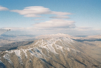 [Mountains as seen from an airplane window.]